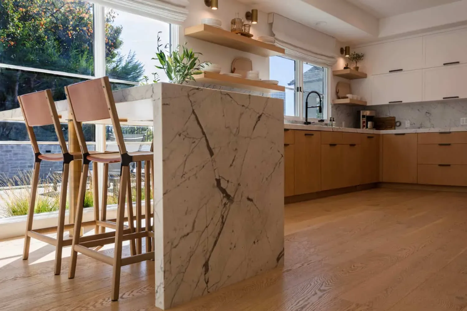 Anaheim Hills kitchen remodel with island seating and a quartz waterfall edge