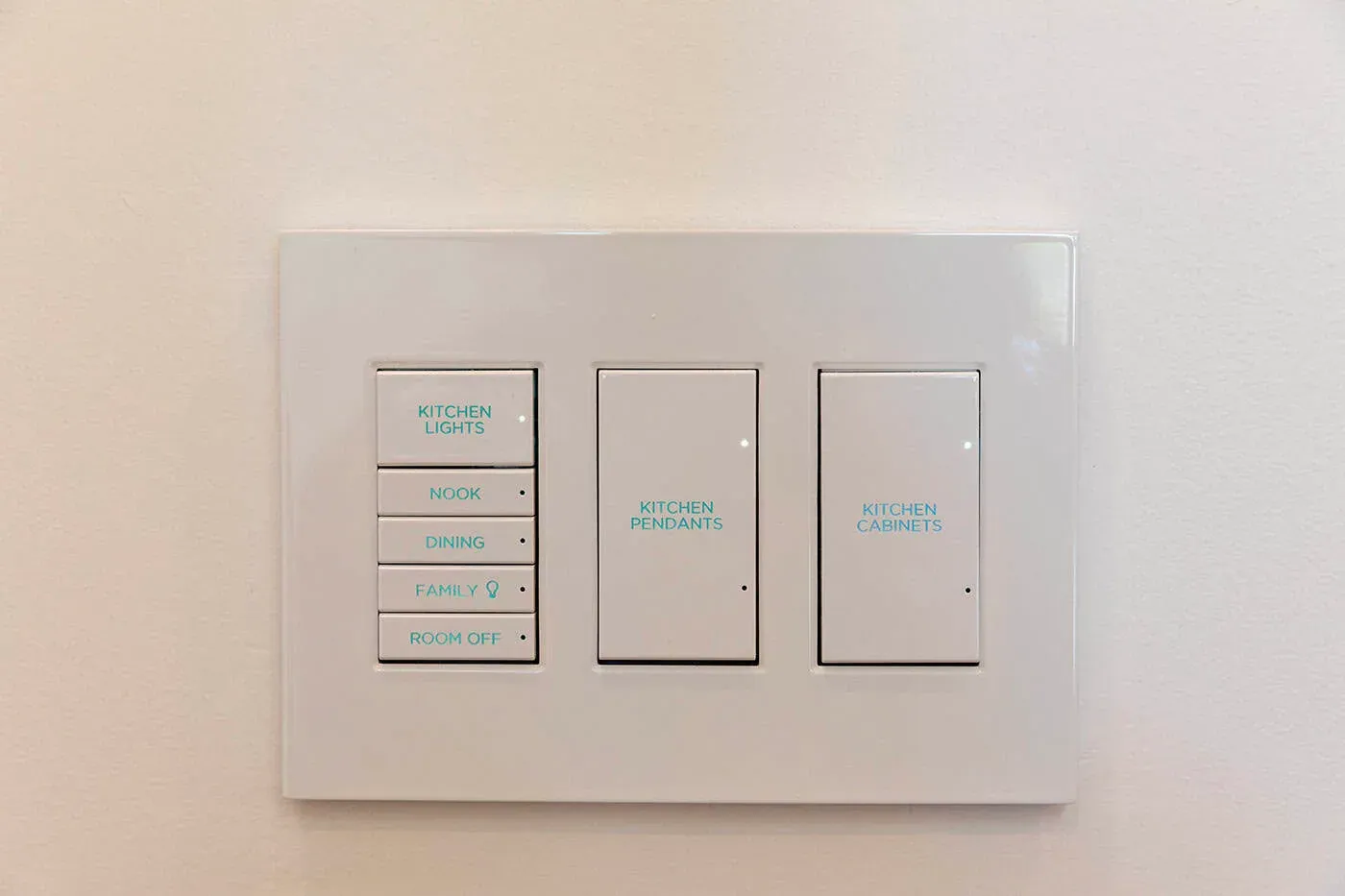 Wall-mounted lighting control panel with labelled scenes